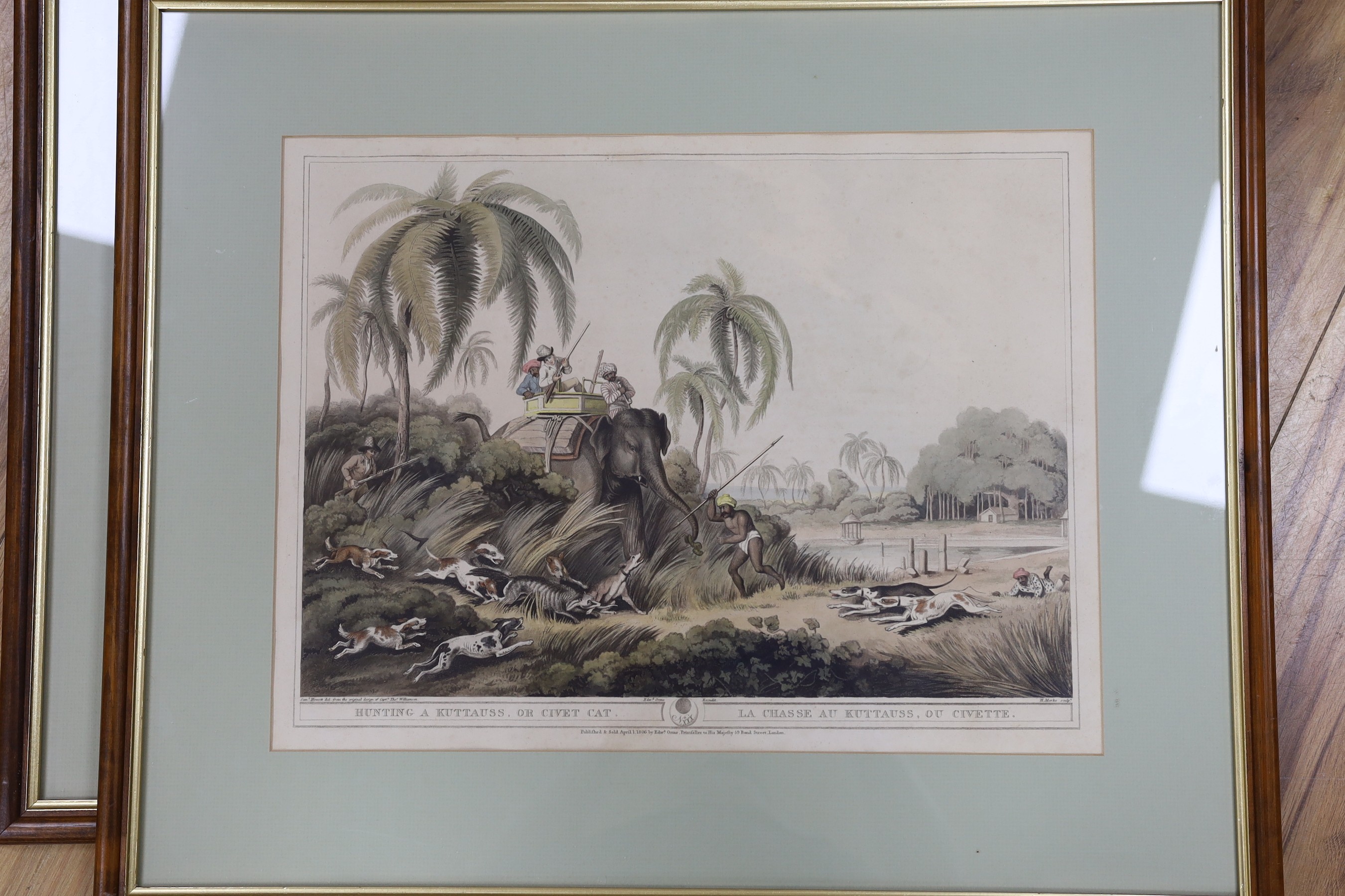 Edward Orme Publ. 1805, four colour prints from Oriental Field Sports, 'The Tiger at Bay', 'The Hog Deer at Bay', 'Hunting a Kuttauss or Civit Cat' and 'Driving elephants into a keddah', overall 36 x 47cm